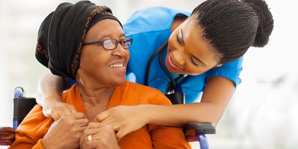 Healthcare provider with patient showing compassionate care